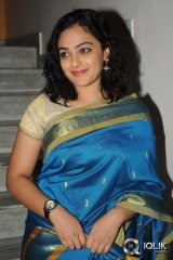 Nithya Menen at Malini 22 Audio Launch Gallery